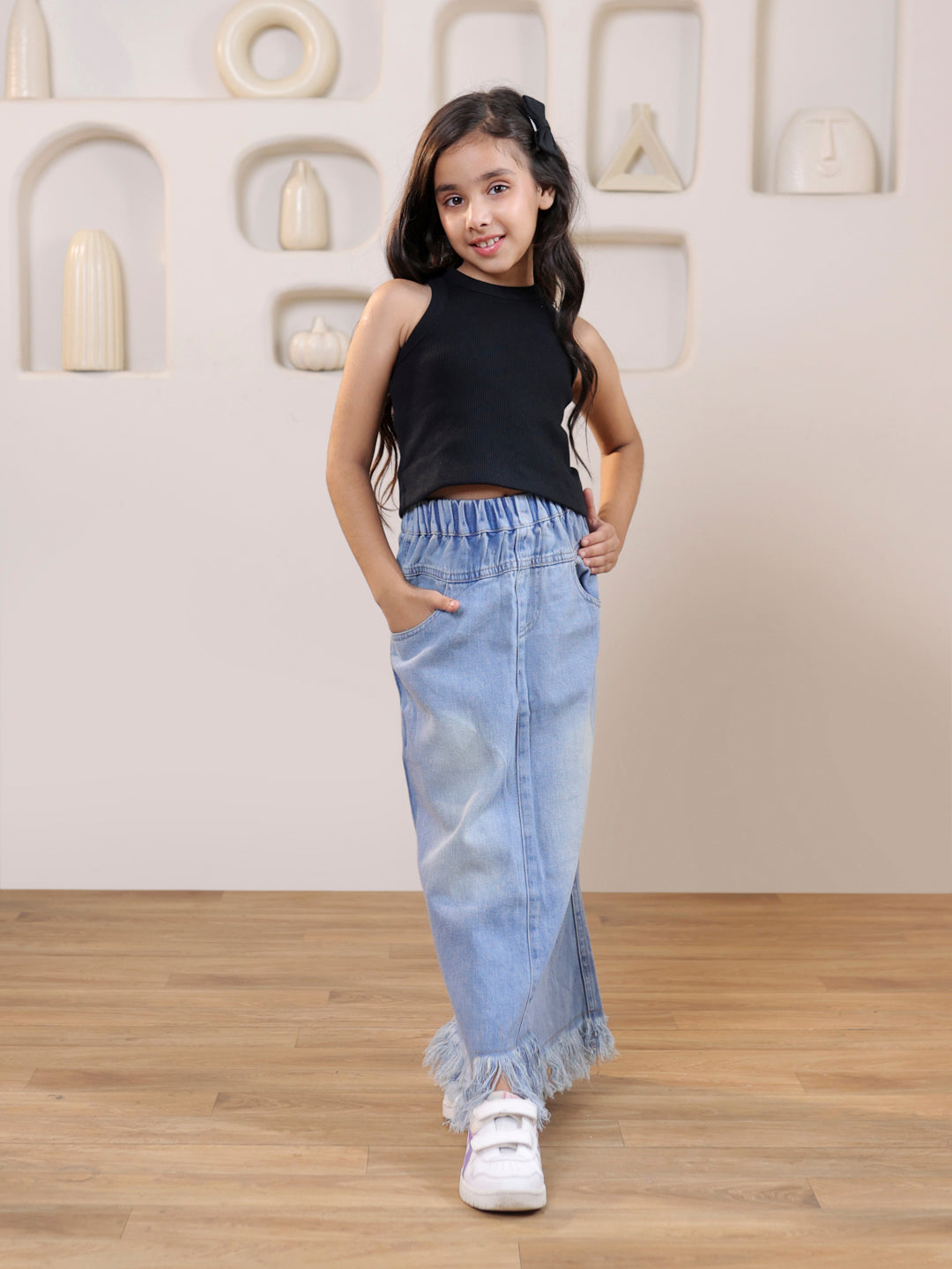 Ribbed sleeveless crop top and distressed faded straight maxi denim skirt