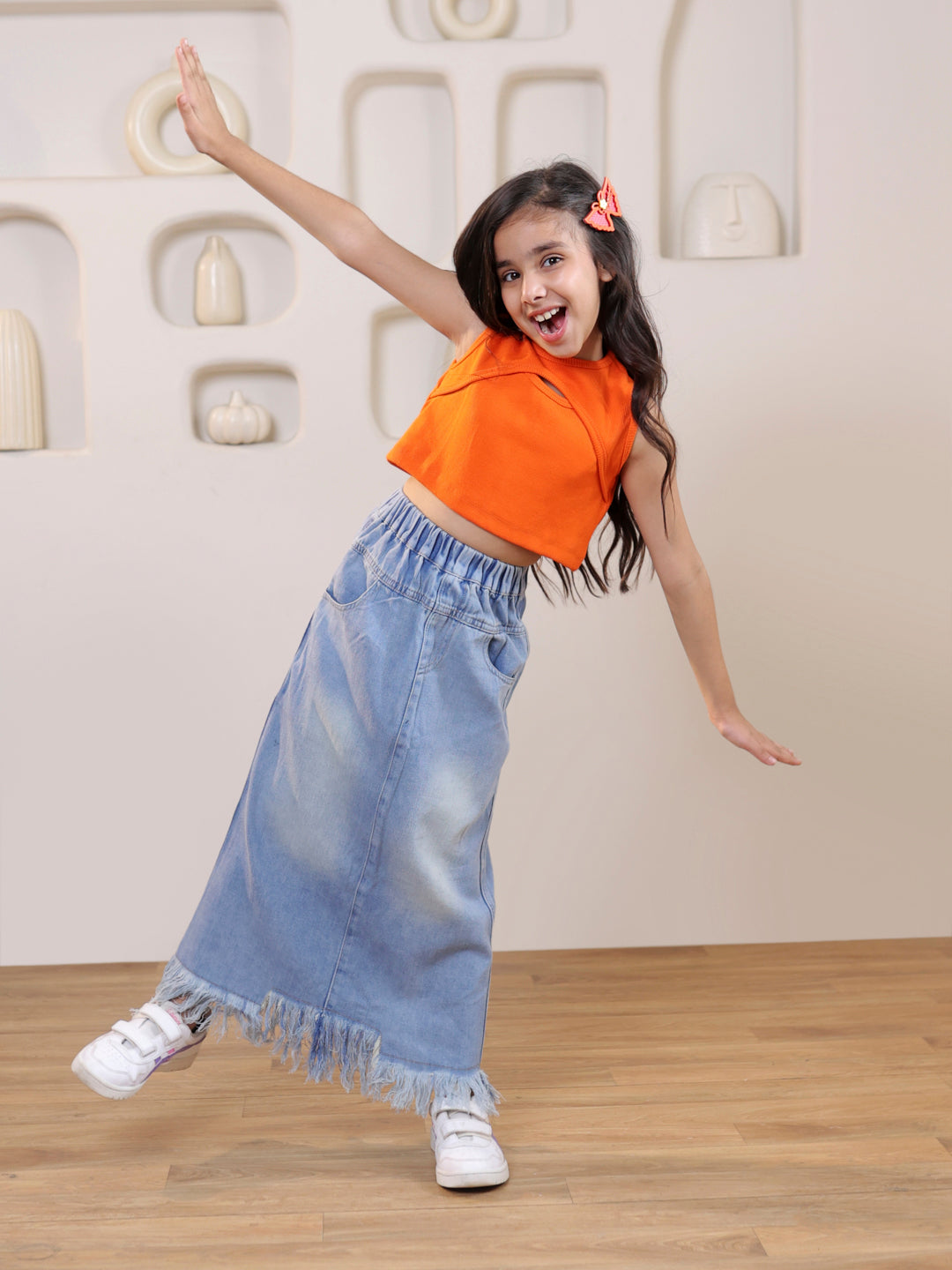 Self design cut out sleeveless crop top and distressed faded straight maxi denim skirt