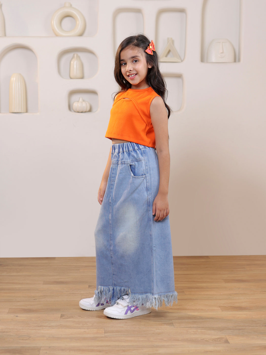 Self design cut out sleeveless crop top and distressed faded straight maxi denim skirt