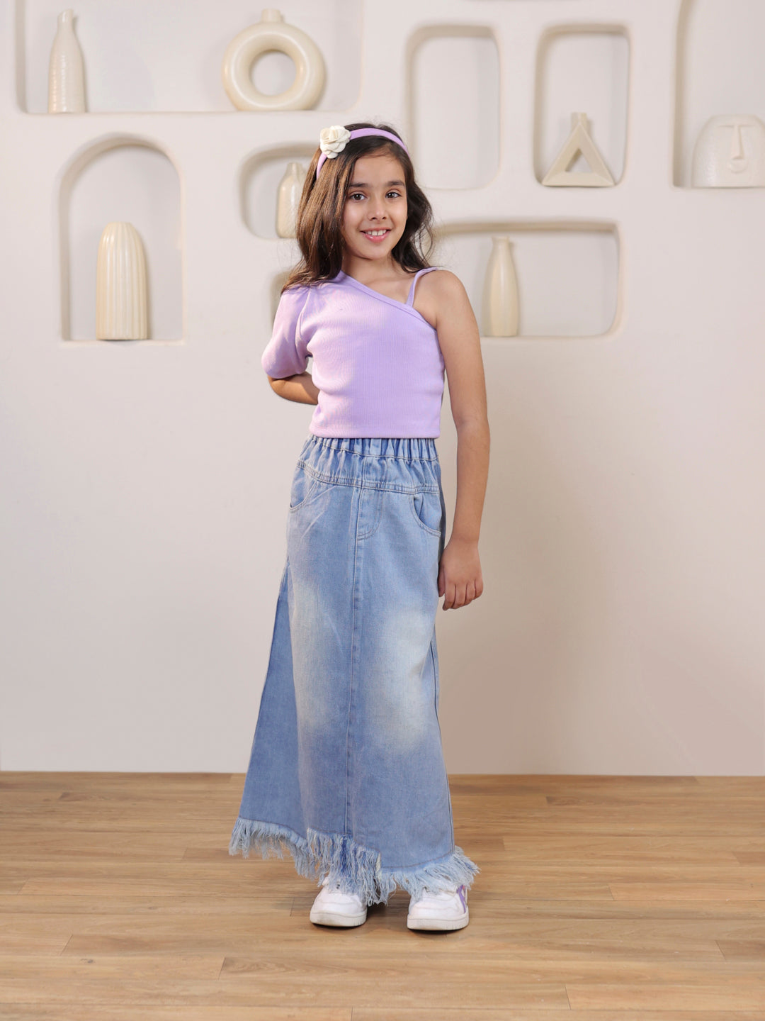 Ribbed one shoulder top and distressed faded straight maxi denim skirt