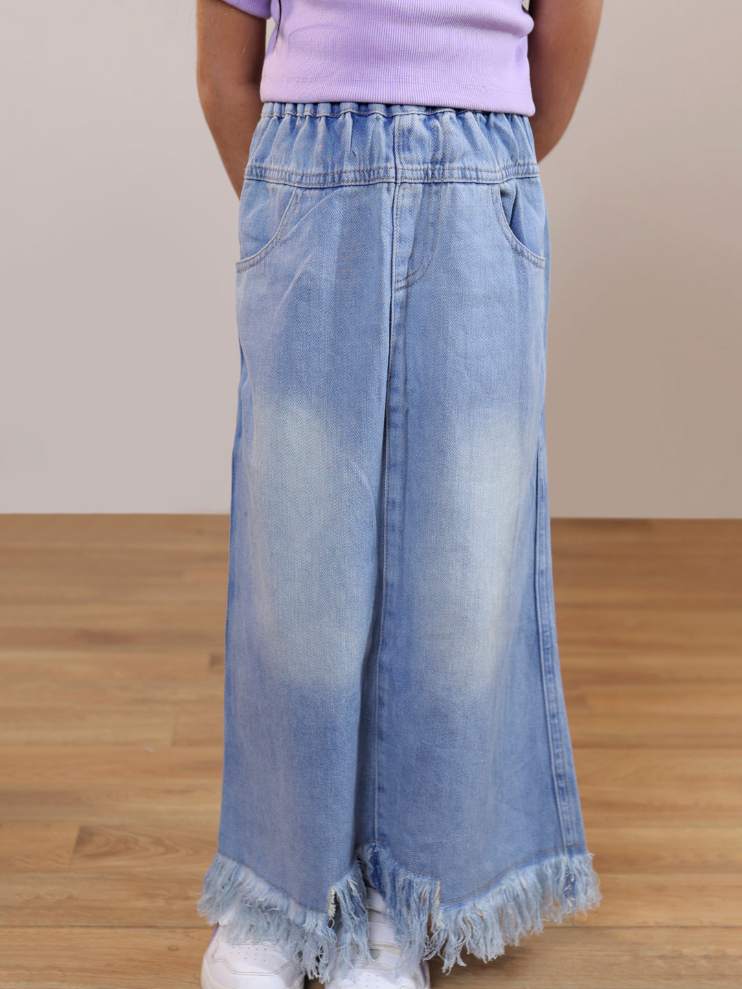 Ribbed one shoulder top and distressed faded straight maxi denim skirt