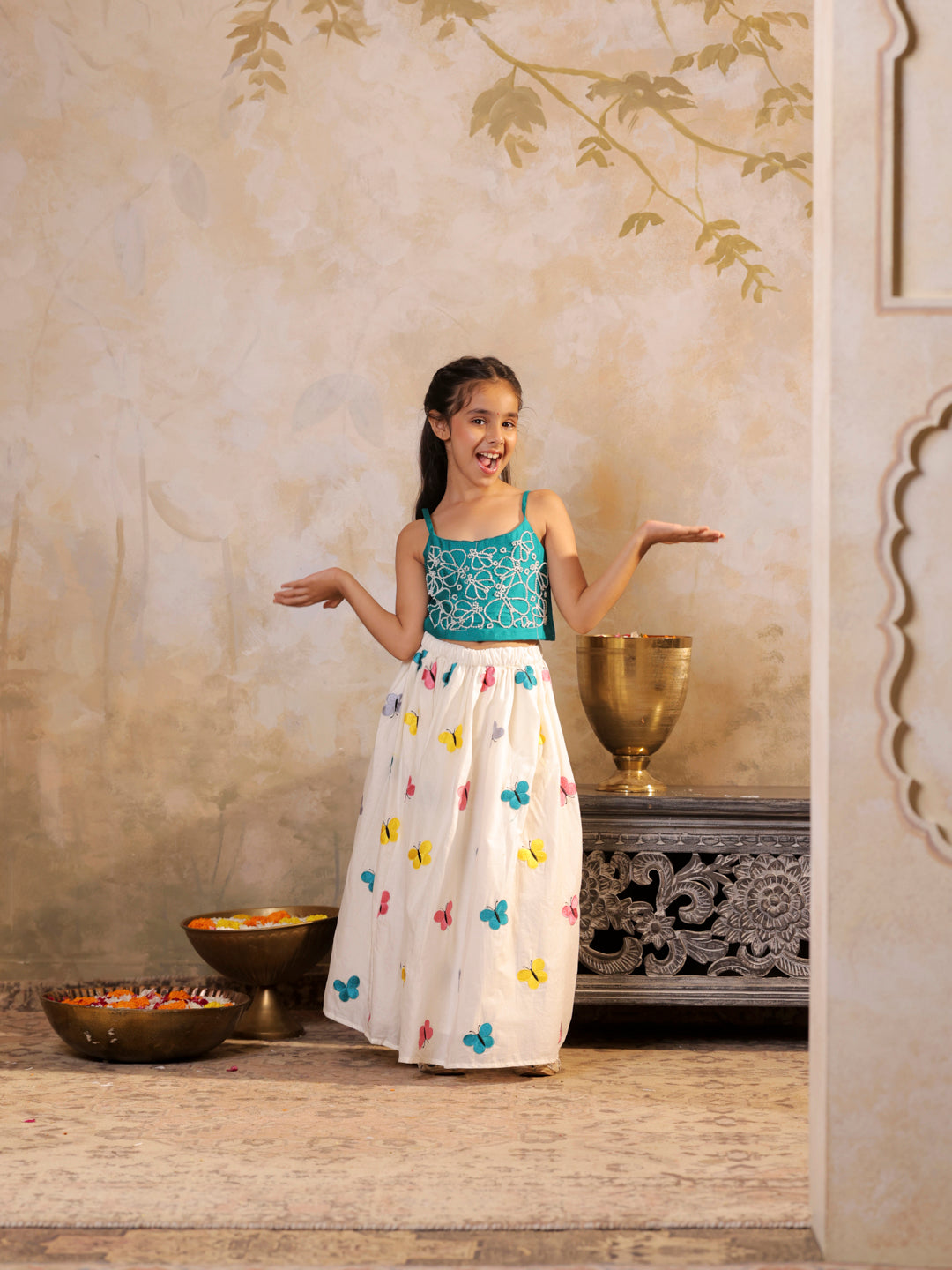 Butterfly embroidered strappy top with flared lehenga