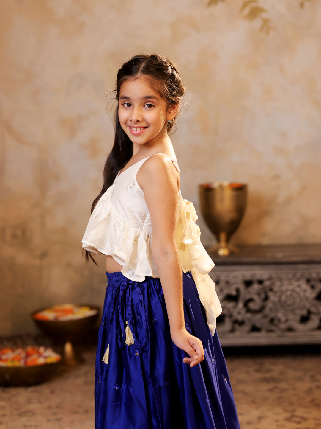 Tie up strap top and faux mirror work lehenga