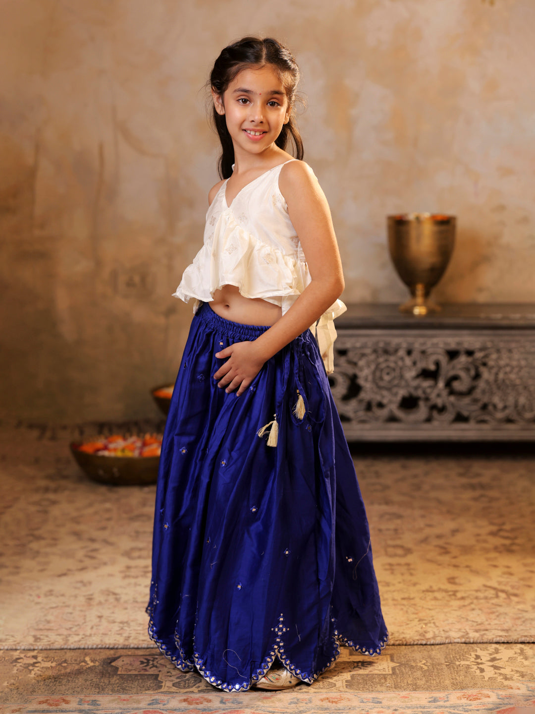 Tie up strap top and faux mirror work lehenga