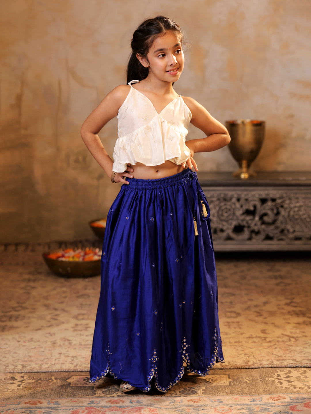 Tie up strap top and faux mirror work lehenga